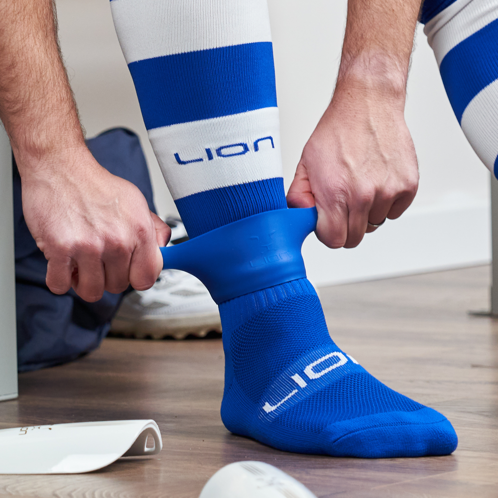 Royal blue silicone holder for shin pad