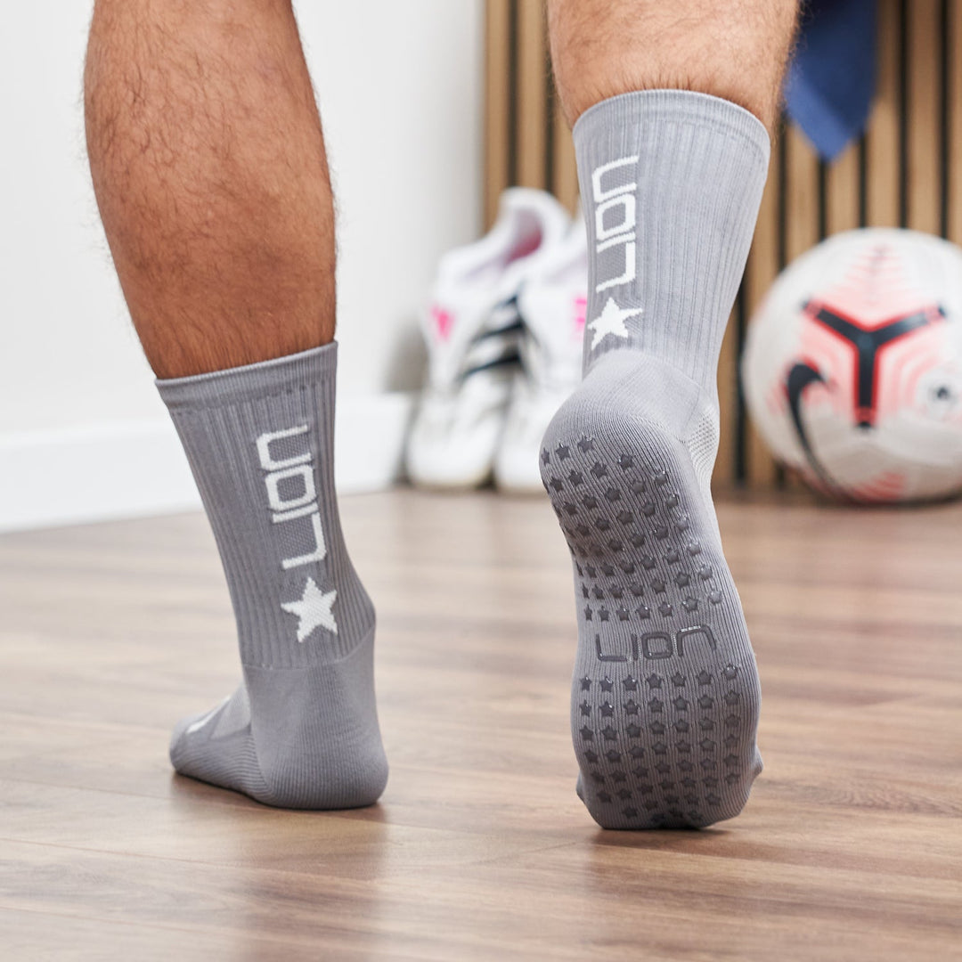 Why Do Footballers Wear Grip Socks?